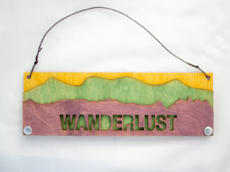 Wanderlust Text Sign with Mountains