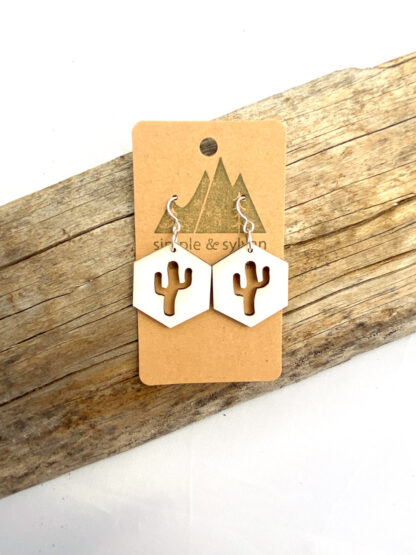 Rustic and adorable white wooden Hexagon earrings with a saguaro cactus laser cut out of the middle